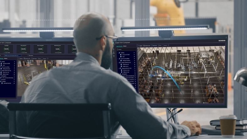 Engineer monitoring AI digital twin system for predictive maintenance on industrial equipment