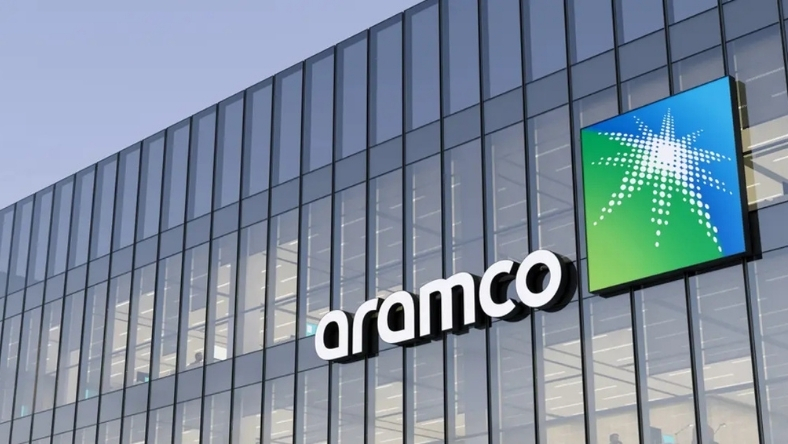 Aramco corporate building with company logo on glass facade